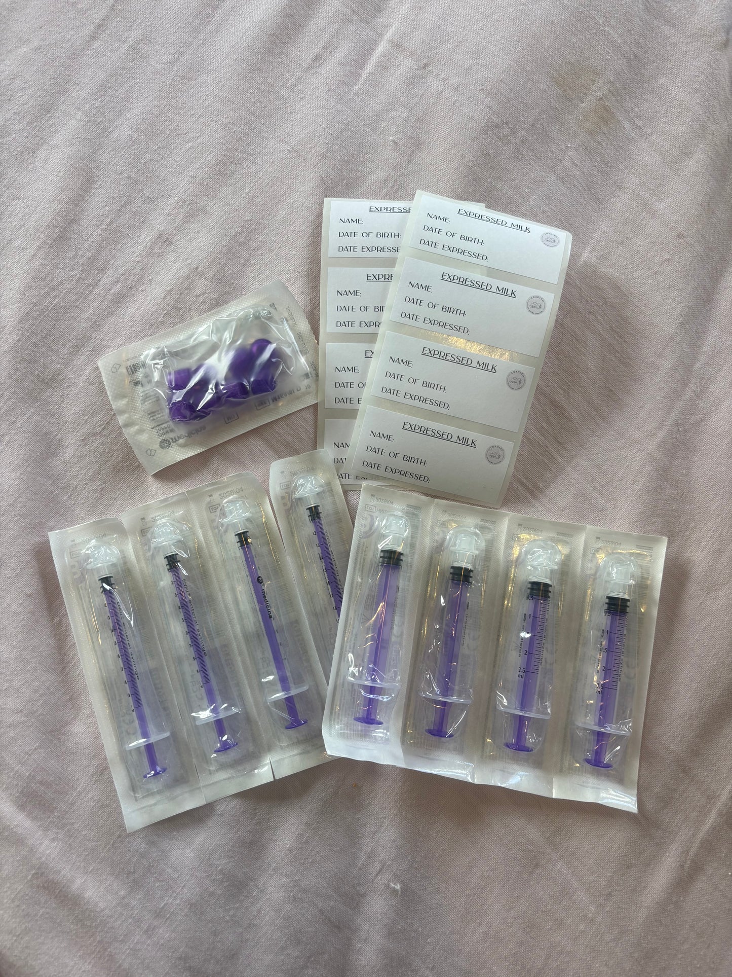Additional oral syringes and caps for colostrum