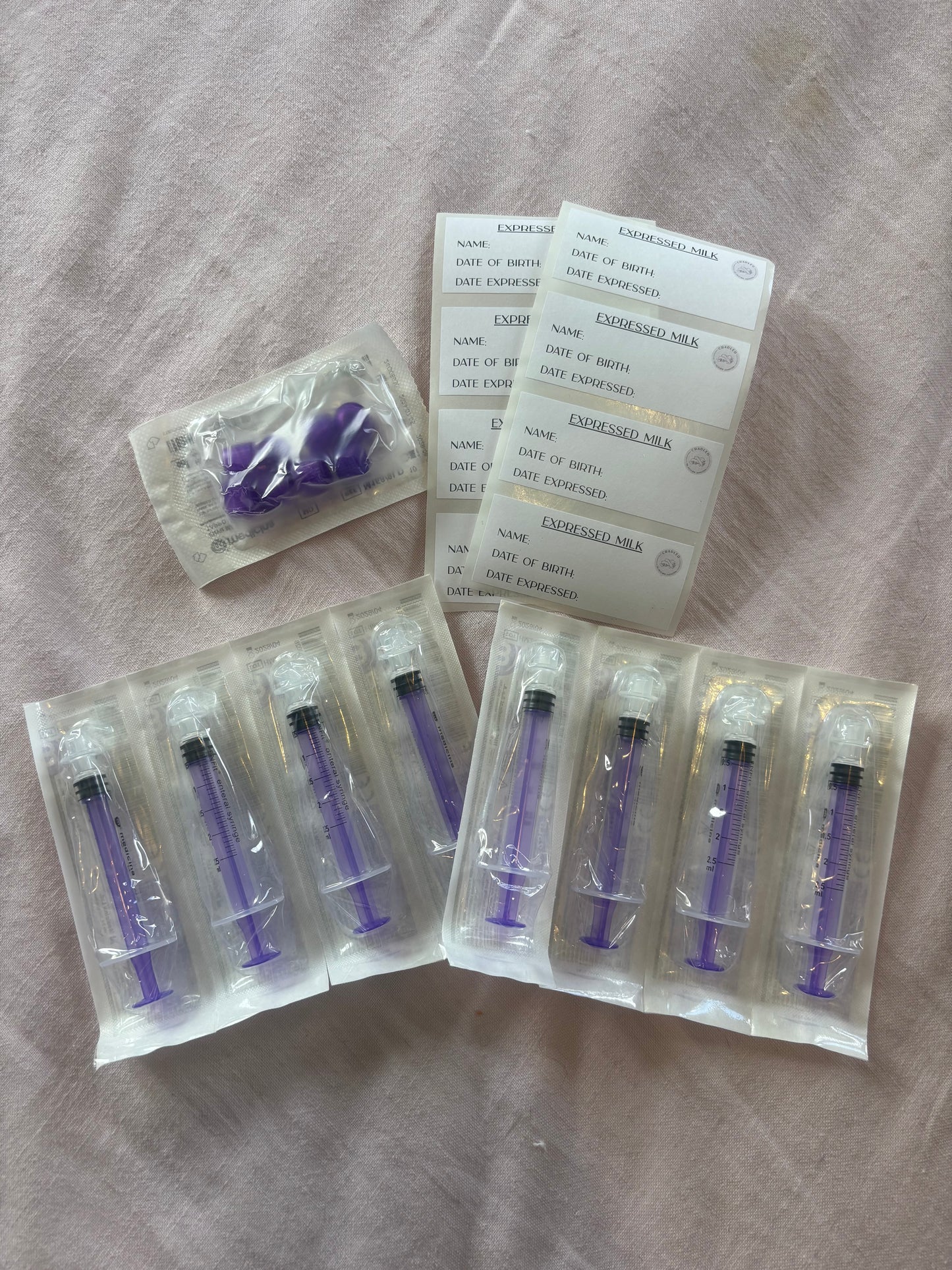 Additional oral syringes and caps for colostrum