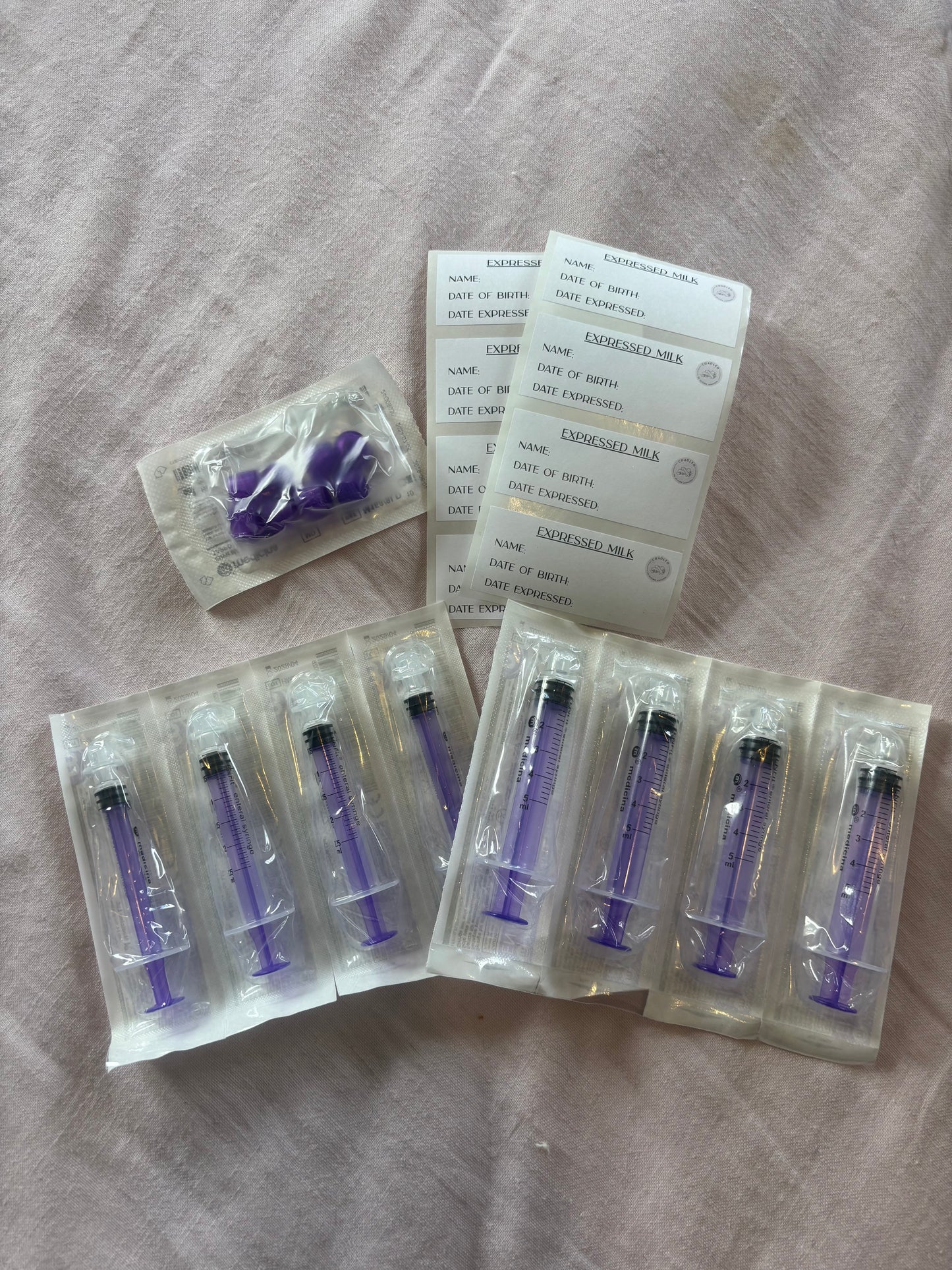 Additional oral syringes and caps for colostrum