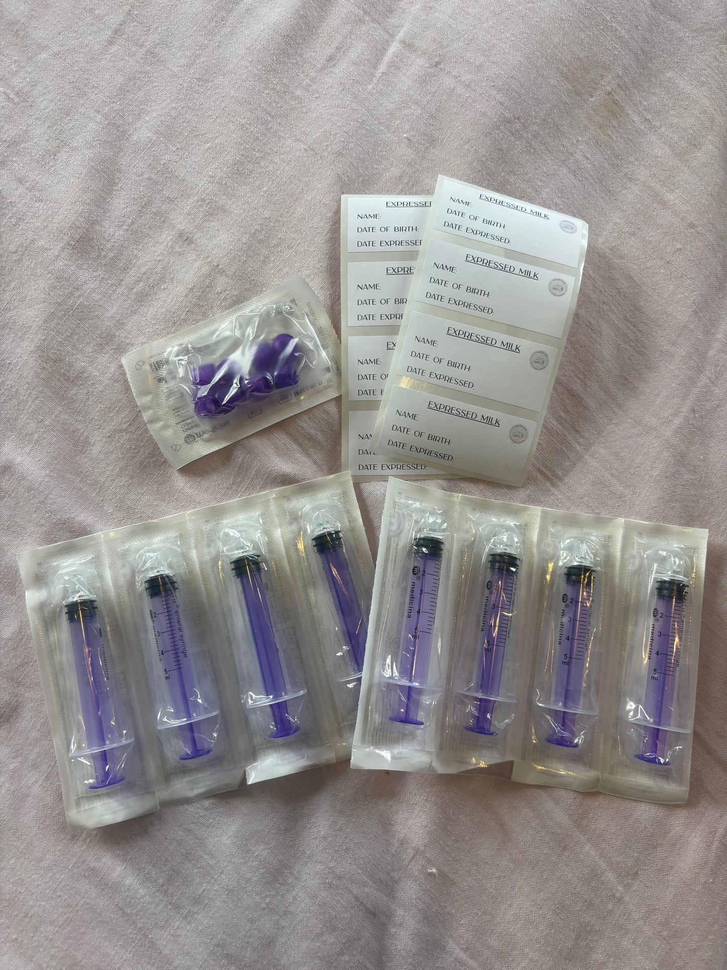 Additional oral syringes and caps for colostrum